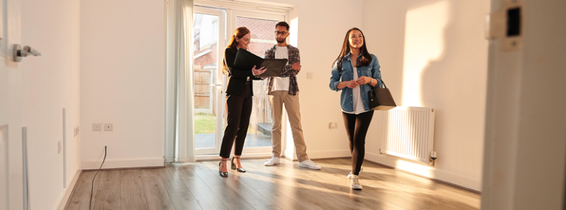 Family visiting a home for sale.